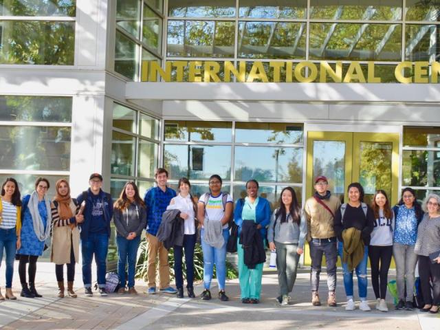 Group of students standing in front of the UC Davis International Center.