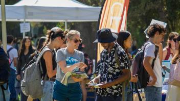 Students gather on the UC Davis campus during the vibrant fall quarter Global Learning Fair.