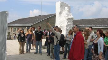 Students walking with a faculty member on a tour.