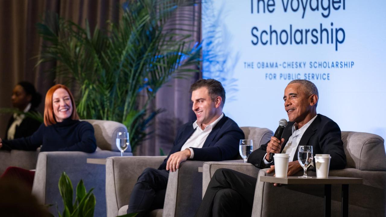Former president Barack Obama and Airbnb co-founder and CEO, Brian Chesky, speak at a Voyager Scholarship panel.