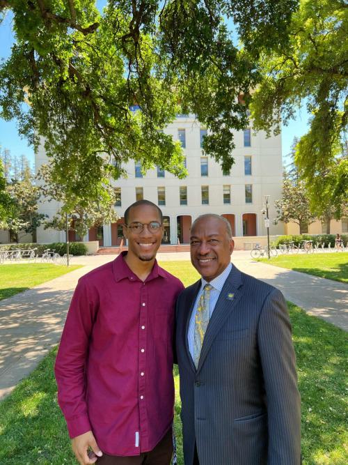 Comeaux and Chancellor May stand side by side in front of Mrak Hall.
