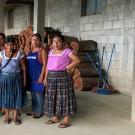 Graduate student Madeline Weeks and Karla Rueda McNeil of Cru Chocolate pose with members of the Red de Mujeres, a women's network in Guatemala