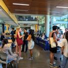 Students interacting at a Global Learning Hub event in the International Center at UC Davis..