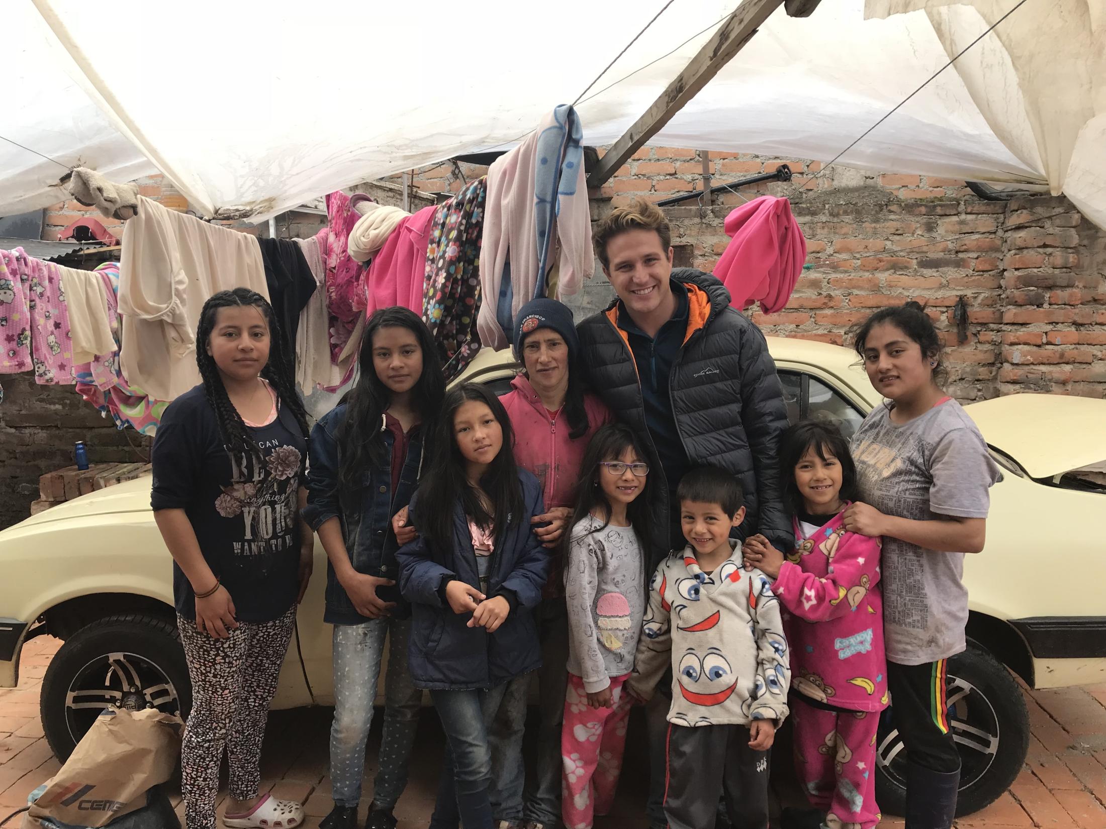 Rawlings stands with nine children in Ipiales, Colombia.