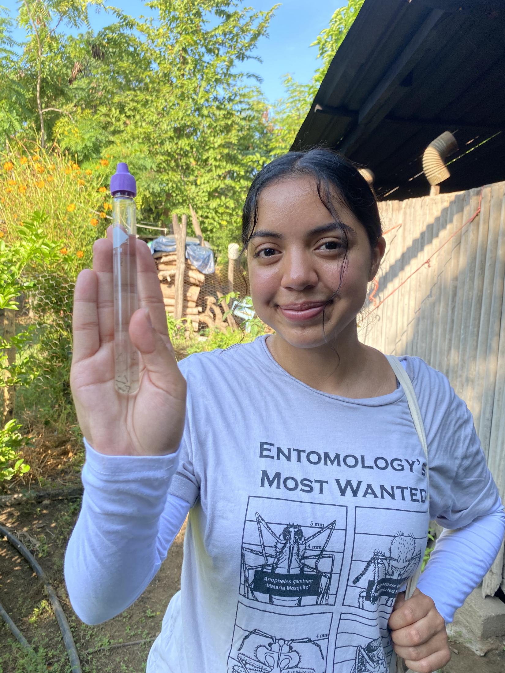 Student holding up a test tube